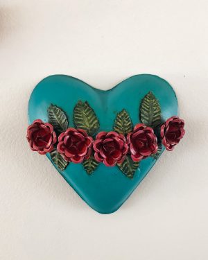 Turquoise tin heart with red roses